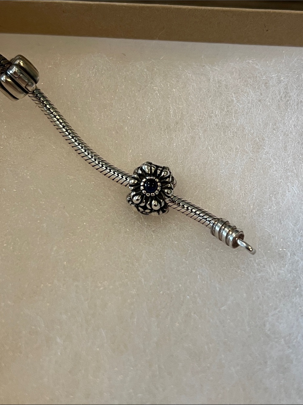 Pandora Sterling Silver Flower Charm (dark blue center stone)